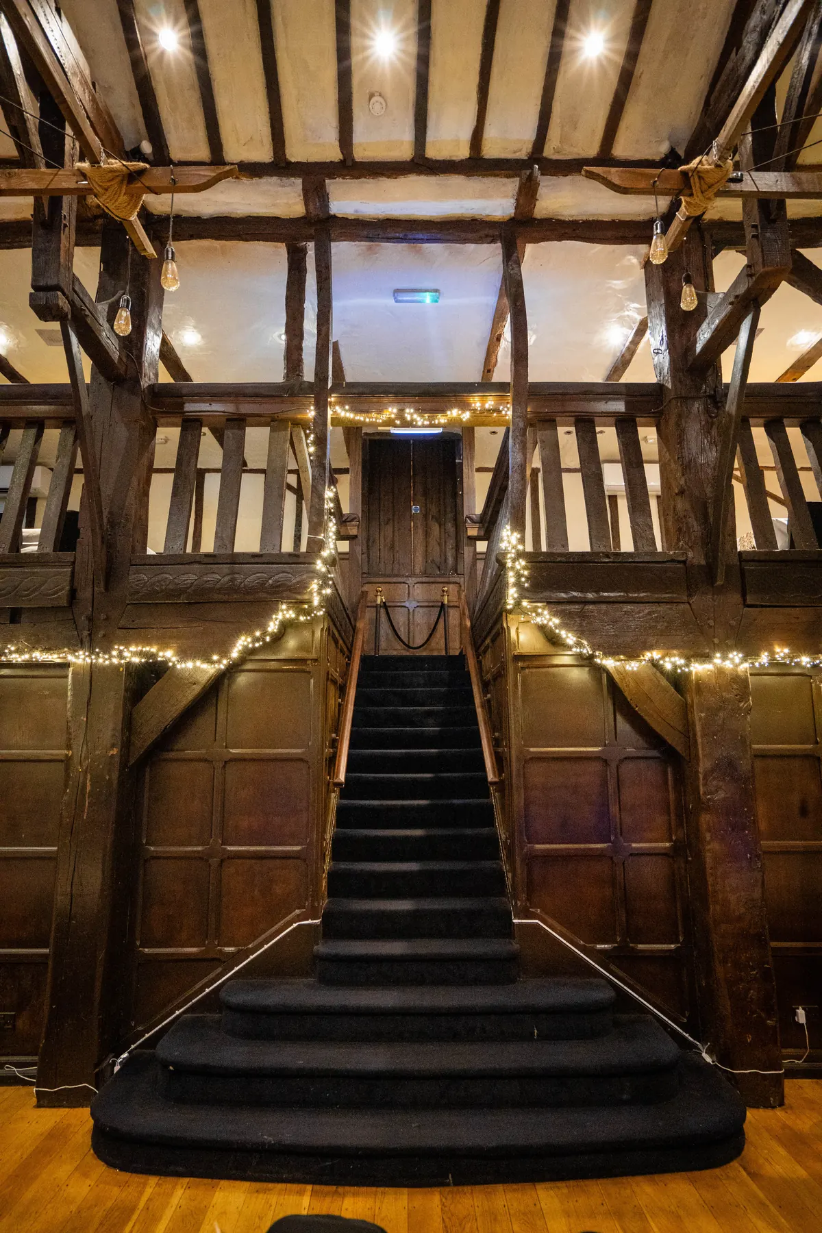 The staircase up to the gallery in the Baronial Hall